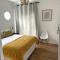 Centrally located modern 2-bedroom home & parking