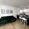 Centrally located modern 2-bedroom home & parking