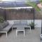 Near beaches large private patio, aircon & community pool