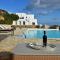 Villa Acqua · Gorgeous pool villa, stunning sea views, helipad! - Parasporos