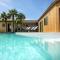 La villa Terracotta - Villa de rêve au calme à 900 m de locéan avec piscine chauffée
