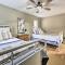 Lakefront Rogers Getaway with Hot Tub and Deck!