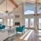 Sunny Lakefront Escape with Private Beach and Deck