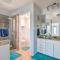 Sunny Lakefront Escape with Private Beach and Deck