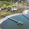 Shipwrecked Shack Waterfront House Boat on Land