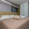Porto Madero 202 – Apartamento Moderno em Condomínio com Piscina e Academia no Rooftop no Centro de Bombinhas.