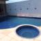 Casa com Piscina, hidromassagem e churrasqueira. - 卡诺格布拉达