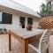 Dolphin Coast Doll House - quaint cottage close to the beach!
