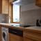 Appartement chaleureux 4 pièces, accès direct aux pistes, proche commerces et services, parking couvert - FR-1-180-178