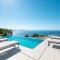 Villa Aristea with sea view, jacuzzi and infinity pool