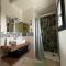 Chambre au calme avec spa privatif gratuit sud aveyron les palmiers des causses - 塔恩河畔圣罗姆