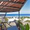 Vue exceptionnelle sur le lagon, sunsets magiques - Isleda Villas - 5* - 拉萨尔勒班