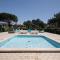 Spacious villa with private garden and shared pool