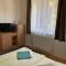 Künszler Apartmanház - زاماردي