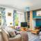 Lakeside property with access into Spa on a nature reserve Bee Cottage HM75