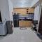 2BR Condo Unit with Washer, INET, Desk Space, ground floor - مدينة دافاو