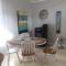 Cozy ,artistic cottage in a garden setting close to the beach and hiking trails.