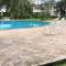 Hermoso apartamento en Manzanillo con alberca y cancha de tenis, Ideal para relajarse y disfrutar de una escapada tranquila en el paraíso tropical