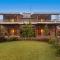 SaffronStays Lake House Bouganvillea, Nashik - rustic pool villa with great lake views and patio dining