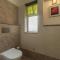SaffronStays Lake House Bouganvillea, Nashik - rustic pool villa with great lake views and patio dining