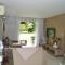 Quarto e sala na natureza (Com Jacuzzi) - ماسيو