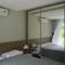 Quarto e sala na natureza (Com Jacuzzi) - ماسيو
