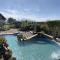 SaffronStays Lake House Bouganvillea, Nashik - rustic pool villa with great lake views and patio dining