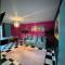 Capsule Miami Vice - Jacuzzi - Billard - Ecran cinéma & Netflix - Ping-Pong - Nintendo & Jeux-
