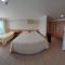 Quarto em condomínio beira-mar