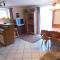 Appartement im Souterrain mit Terrasse
