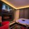 Suite cinéma et jacuzzi privé
