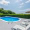 Holiday Home Flora with pool