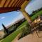 An agritourism complex with views of Assisi