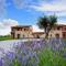 An agritourism complex with views of Assisi