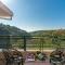 StayVista at Creek Edge Home - Pet Friendly Villa with Mountain Views, Lawn, Near Water Stream