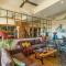 StayVista at Creek Edge Home - Pet Friendly Villa with Mountain Views, Lawn, Near Water Stream