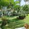 "Aimé Gwada", appartement à 40m de la plage, Rez-de-jardin tropical