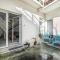 Les Volets Bleus T3 de 80 m2 patio privatif