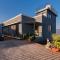 Eyes On The Lake by StayVista - A hillside villa with a captivating view of the river - Pune