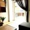 Modern condo with garage near the square and beach
