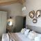 Elaiopetra Kefalonia - Stonehouse Hideaway with pool - Modern Luxury with Serene Sea and Mountain Views - Metaxáta