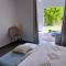 Logement paisible jacuzzi jardin privatif climatisation