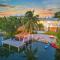 Oceanfront villa with private beach, heated pool, tiki and boat dock - Key West