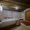 Risus Cave Suites