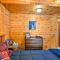Cozy Manistique Cabin with Deck, Grill and Fire Pit!