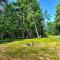 Cozy Manistique Cabin with Deck, Grill and Fire Pit!