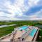 Relax with a Fabulous Ocean View Ocean Sounds in This 2 Bedroom 2 Bath Den