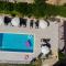 Holiday House App Grace with pool and view in Klis