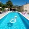 Holiday House App Grace with pool and view in Klis