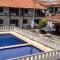 Refúgio Peró - Praia, piscina e churrasqueira